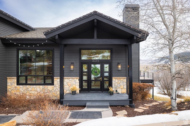 4673 Nelson Ct, Park City, UT 84098 - property entrance with stone siding and a chimney