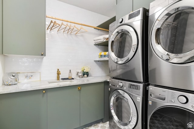 4673 Nelson Ct, Park City, UT 84098 - clothes washing area featuring stacked washer / dryer and cabinet space