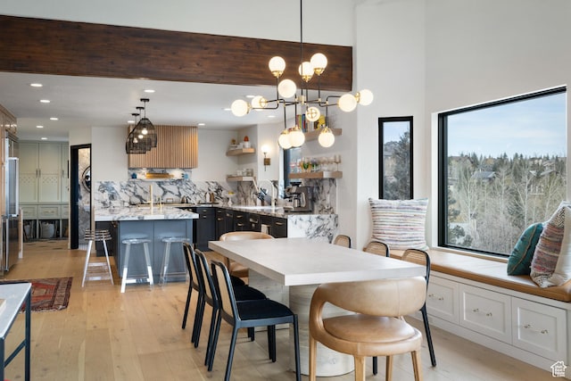 4673 Nelson Ct, Park City, UT 84098 - dining room with light wood-style flooring, a chandelier, and recessed lighting