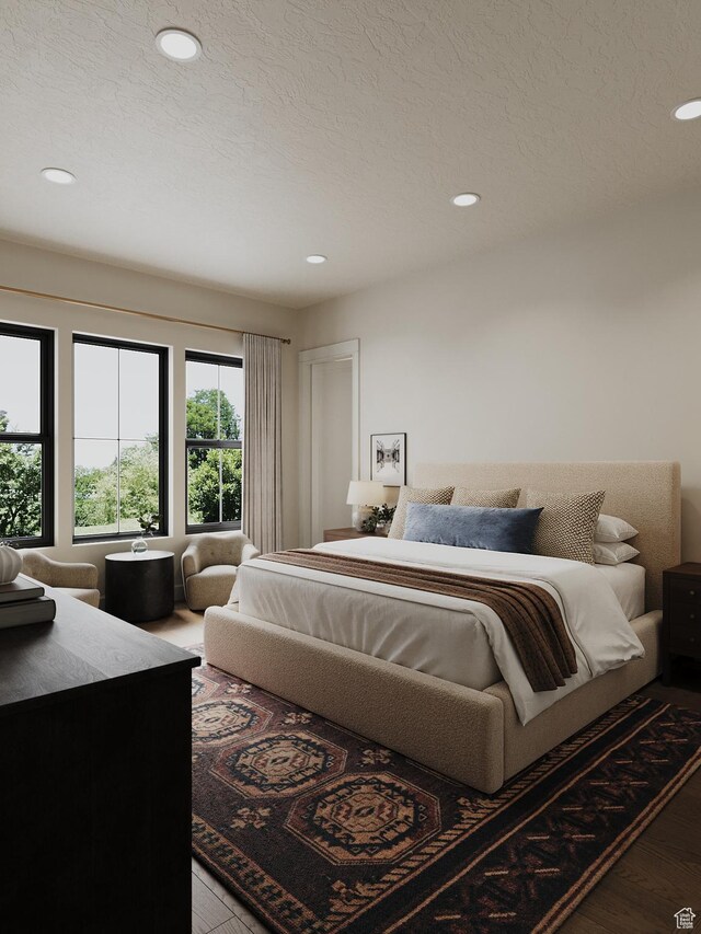 387 S 7900th St E Unit 13, Huntsville, UT 84317 - bedroom featuring wood finished floors, recessed lighting, and a textured ceiling
