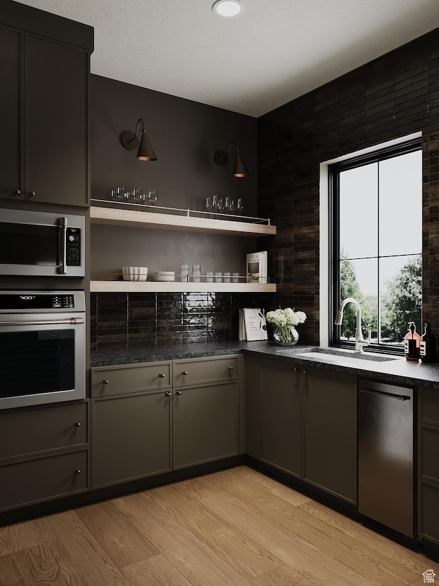 387 S 7900th St E Unit 13, Huntsville, UT 84317 - kitchen featuring stainless steel appliances, open shelves, and light wood finished floors