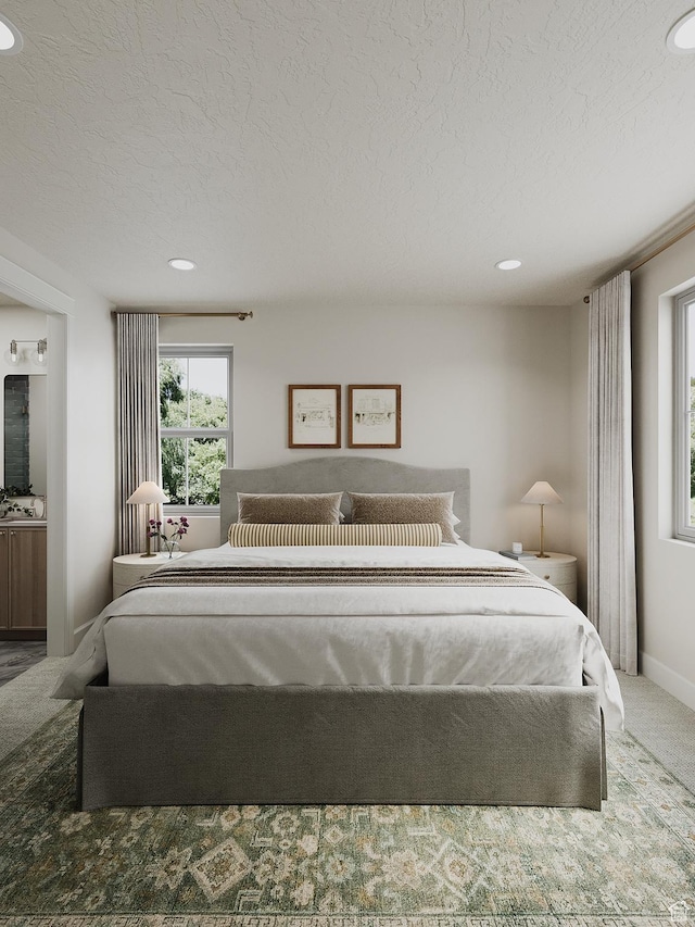 387 S 7900th St E Unit 13, Huntsville, UT 84317 - carpeted bedroom featuring a textured ceiling, recessed lighting, and ensuite bath