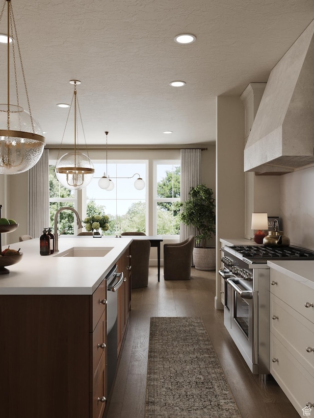 439 S 7900 E Unit 11, Huntsville, UT 84317 - kitchen featuring wall chimney range hood, appliances with stainless steel finishes, plenty of natural light, light countertops, and recessed lighting