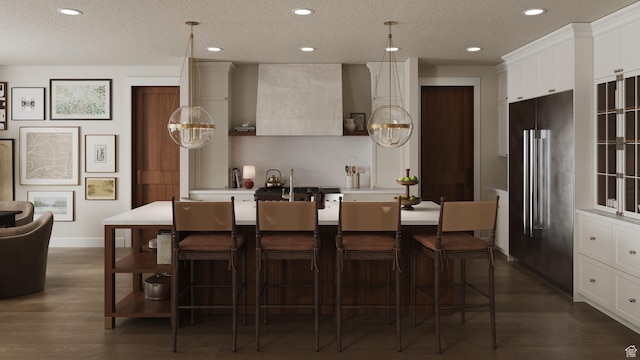 439 S 7900 E Unit 11, Huntsville, UT 84317 - kitchen with high end fridge, a chandelier, a center island with sink, recessed lighting, and dark wood-type flooring