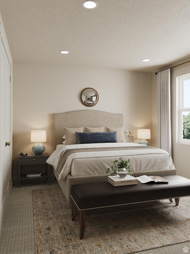 439 S 7900 E Unit 11, Huntsville, UT 84317 - bedroom with a textured ceiling, carpet flooring, and recessed lighting