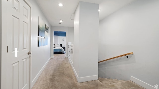 hall with recessed lighting, baseboards, and carpet