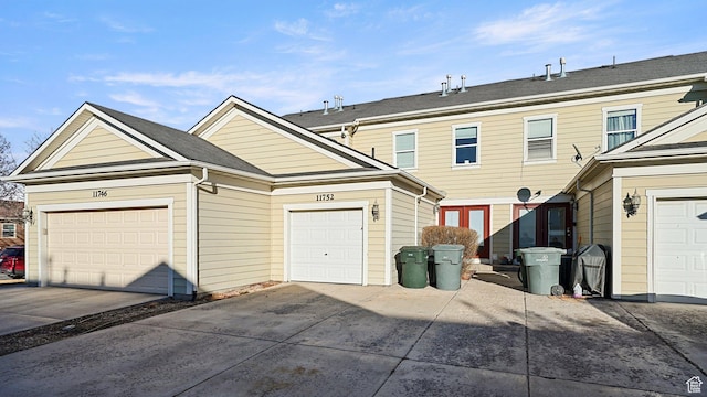 exterior space with concrete driveway
