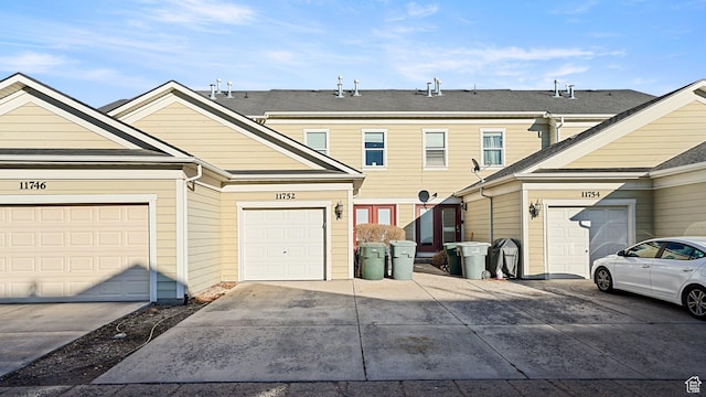 exterior space featuring concrete driveway