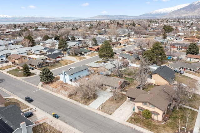 birds eye view of property featuring a mountain view and a residential view