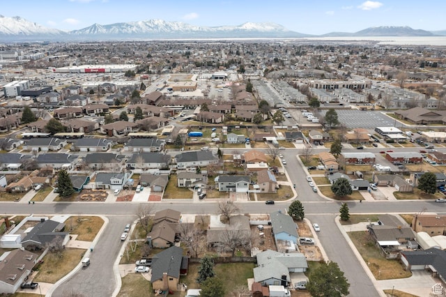 drone / aerial view featuring a mountain view and a residential view