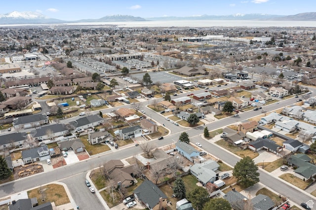 aerial view featuring a mountain view and a residential view