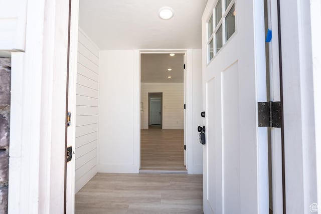 corridor with recessed lighting and light wood-style floors