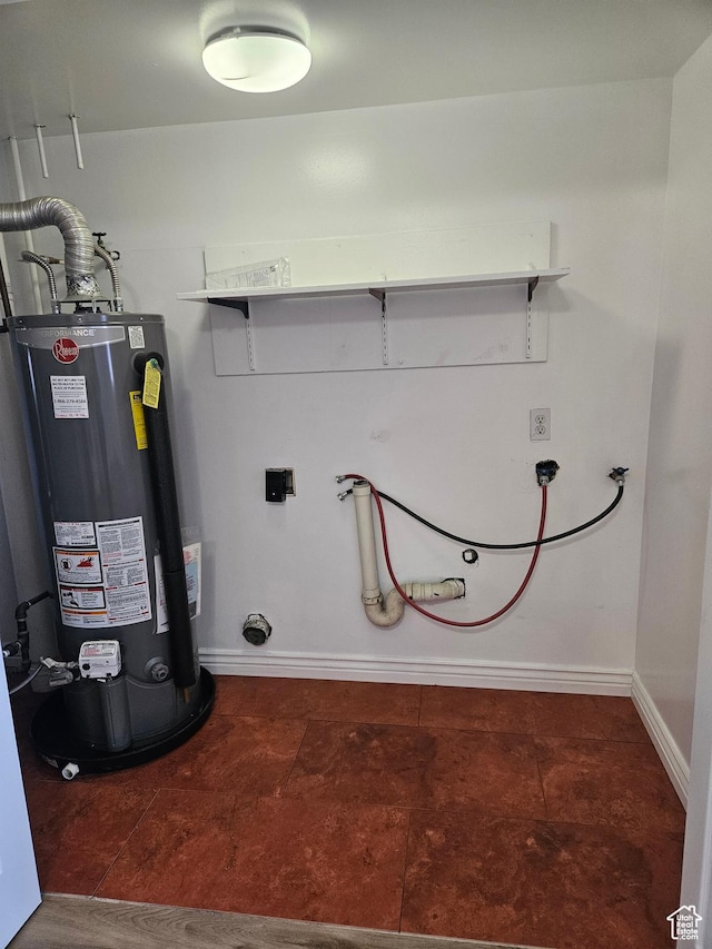 3673 S 2200 W Unit 15, West Valley City, UT 84119 - clothes washing area featuring hookup for a washing machine, gas water heater, baseboards, and laundry area