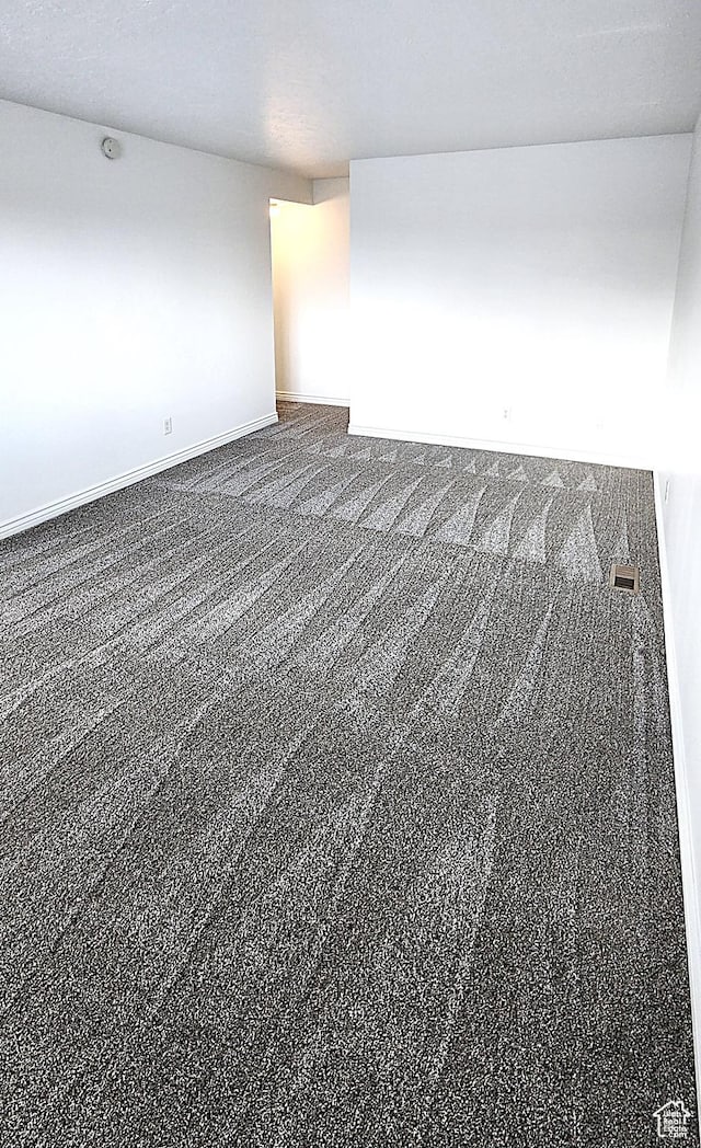 3673 S 2200 W Unit 15, West Valley City, UT 84119 - carpeted spare room featuring baseboards