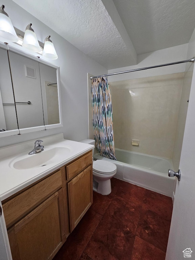 3673 S 2200 W Unit 15, West Valley City, UT 84119 - bathroom featuring visible vents, toilet, shower / bath combo with shower curtain, a textured ceiling, and vanity