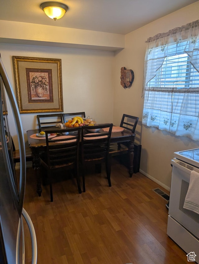 556 W 800 N Unit 18, Provo, UT 84601 - dining area with baseboards, visible vents, and wood finished floors