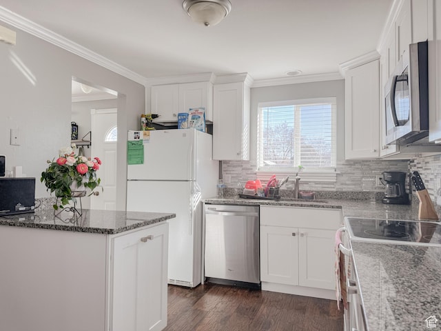3140 S 4140 W, West Valley City, UT 84120 - kitchen with appliances with stainless steel finishes, dark wood-style flooring, crown molding, and white cabinetry