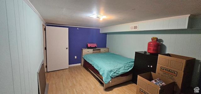 1433 W 2060 N, Helper, UT 84526 - bedroom featuring light wood finished floors and crown molding