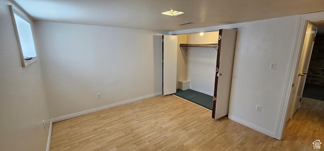 1433 W 2060 N, Helper, UT 84526 - unfurnished bedroom featuring light wood-type flooring and a closet