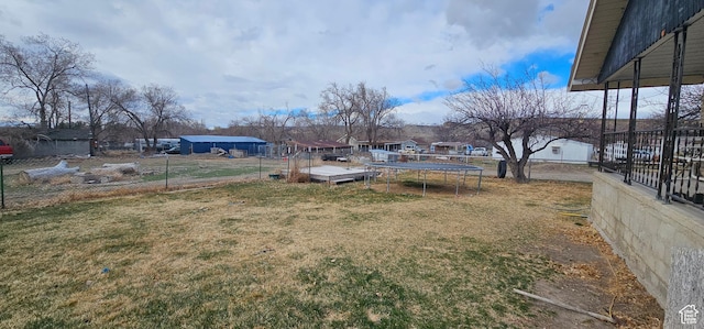 1433 W 2060 N, Helper, UT 84526 - view of yard featuring a trampoline and a residential view