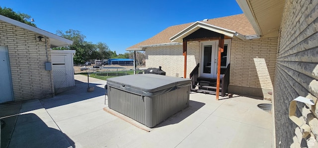 1433 W 2060 N, Helper, UT 84526 - view of patio with entry steps and a hot tub