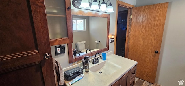 1433 W 2060 N, Helper, UT 84526 - bathroom with vanity, a chandelier, and wood finished floors