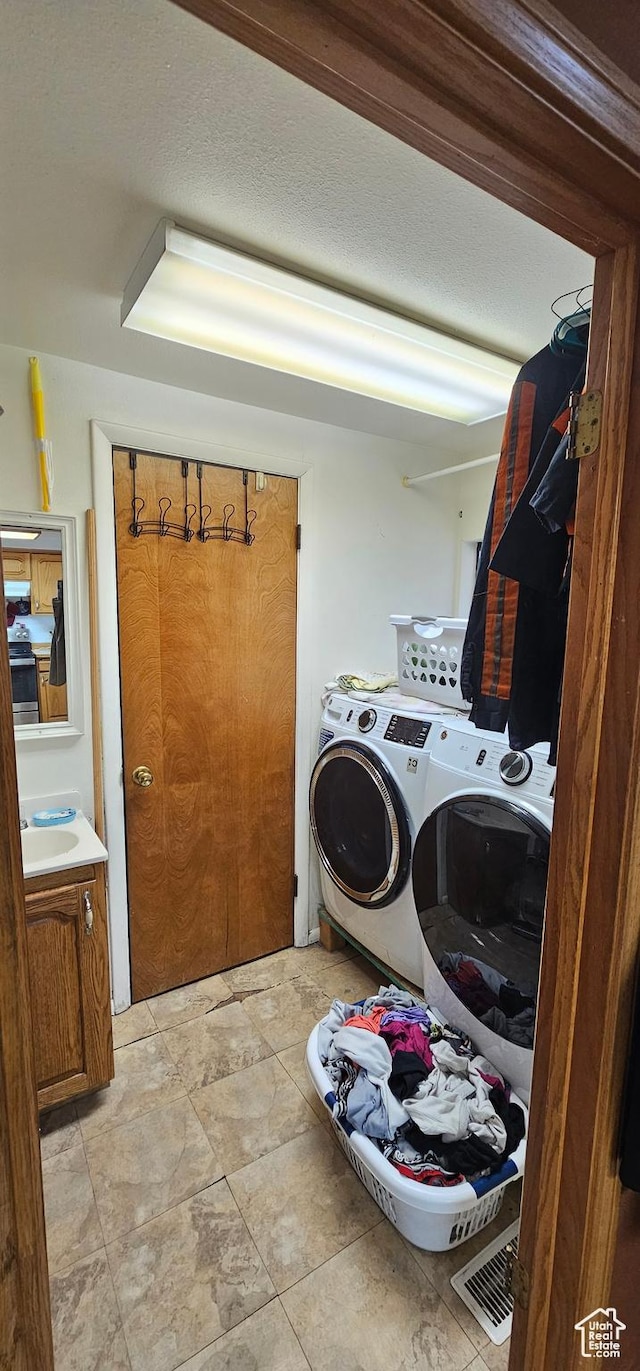 1433 W 2060 N, Helper, UT 84526 - washroom featuring washer and clothes dryer