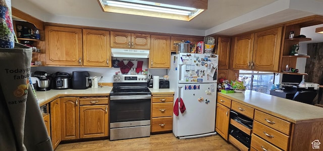 1433 W 2060 N, Helper, UT 84526 - kitchen with stainless steel range with electric cooktop, freestanding refrigerator, open shelves, under cabinet range hood, and a peninsula