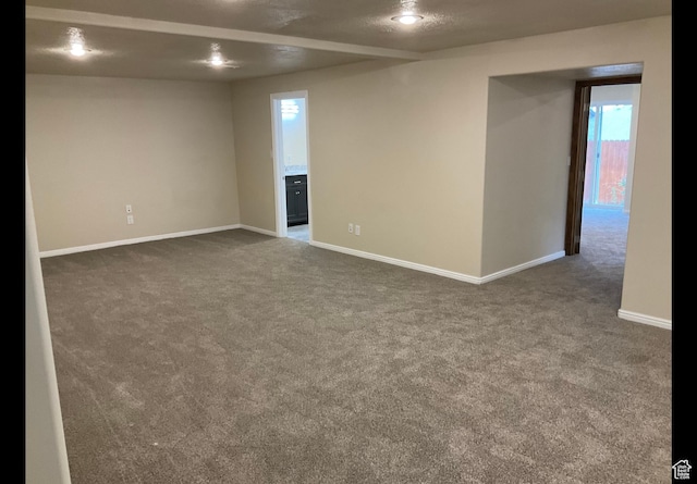 2843 W Pine Cone Ln N, Lehi, UT 84043 - unfurnished room with dark colored carpet and baseboards
