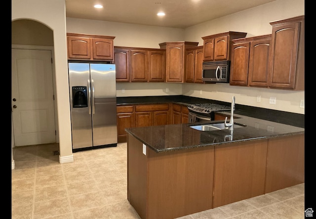 2843 W Pine Cone Ln N, Lehi, UT 84043 - kitchen featuring dark stone countertops, a sink, recessed lighting, appliances with stainless steel finishes, and a peninsula