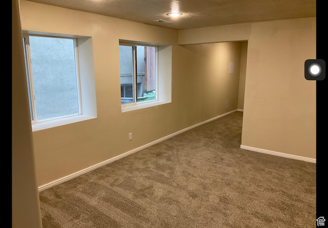 2843 W Pine Cone Ln N, Lehi, UT 84043 - carpeted spare room with baseboards and a textured ceiling