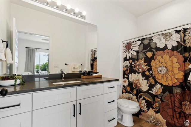 971 W 1700 S Unit 114, Salt Lake City, UT 84104 - full bath featuring curtained shower, toilet, and vanity