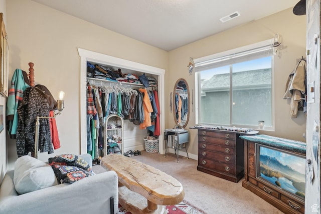 spacious closet with carpet flooring and visible vents