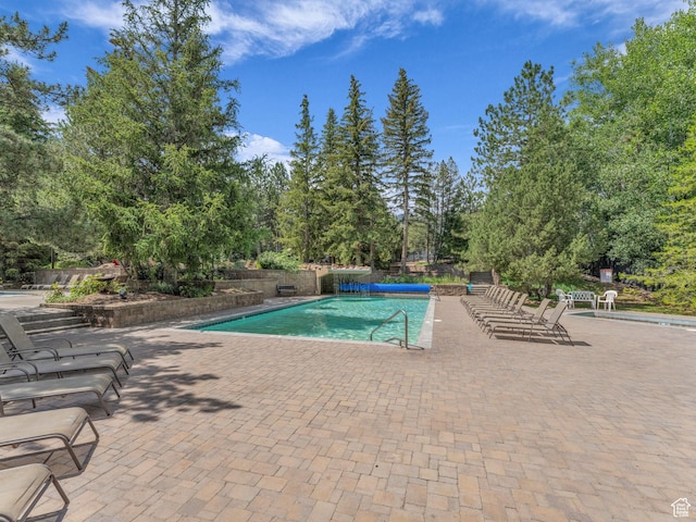 2025 Canyons Resort Dr Unit R8, Park City, UT 84060 - community pool with a patio area and view of wooded area