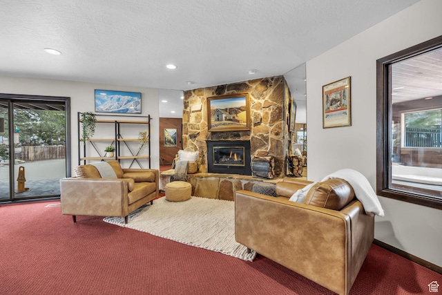 2025 Canyons Resort Dr Unit R8, Park City, UT 84060 - living room with recessed lighting, carpet floors, a textured ceiling, and a fireplace