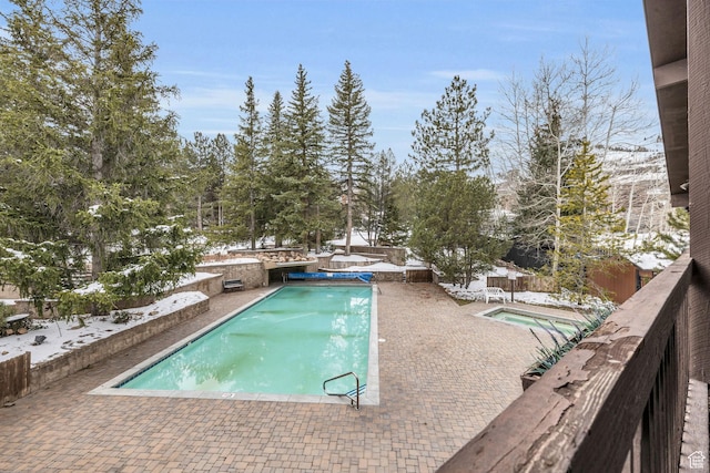 2025 Canyons Resort Dr Unit R8, Park City, UT 84060 - view of swimming pool with a fenced in pool, an in ground hot tub, a fenced backyard, and a patio area