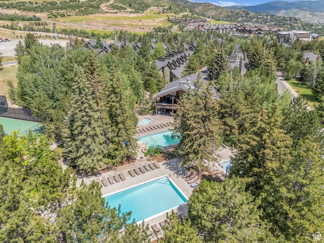 2025 Canyons Resort Dr Unit R8, Park City, UT 84060 - drone / aerial view of a pool area and a mountain backdrop