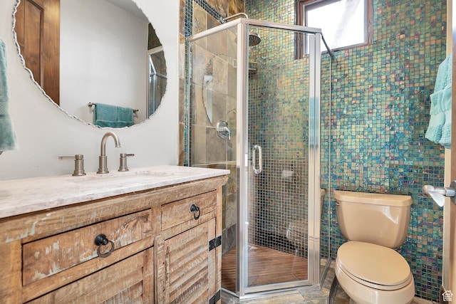 2336 W Entrada Trl Unit 44, St George, UT 84770 - full bathroom featuring a stall shower, toilet, and vanity