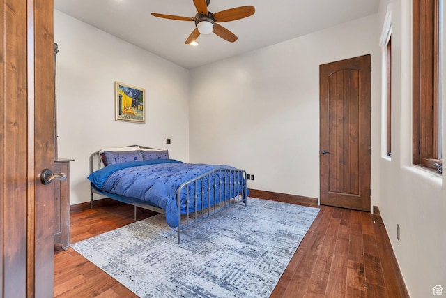 2336 W Entrada Trl Unit 44, St George, UT 84770 - bedroom featuring wood finished floors, baseboards, recessed lighting, and a ceiling fan