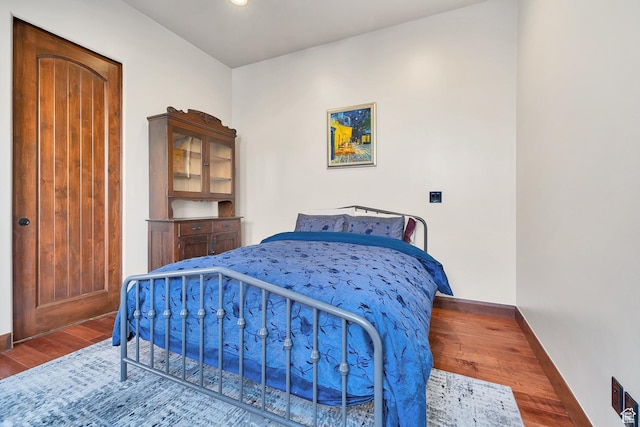 2336 W Entrada Trl Unit 44, St George, UT 84770 - bedroom with wood finished floors and baseboards