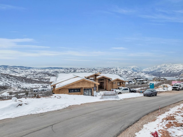 2127 E Peak Dr, Hideout, UT 84036 - view of front of house featuring brick siding and a mountain view