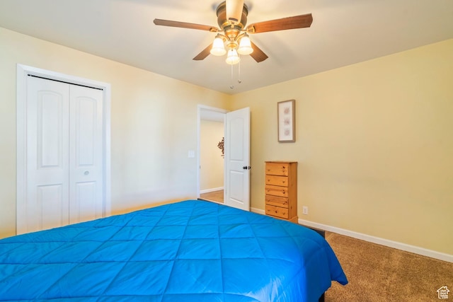 5809 S Waterbury Dr Unit D, Murray, UT 84121 - carpeted bedroom featuring a closet, ceiling fan, and baseboards