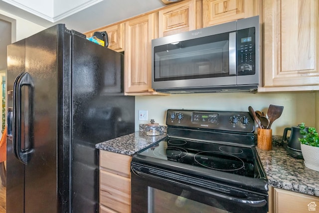 5809 S Waterbury Dr Unit D, Murray, UT 84121 - kitchen with black appliances, light brown cabinets, and dark stone counters