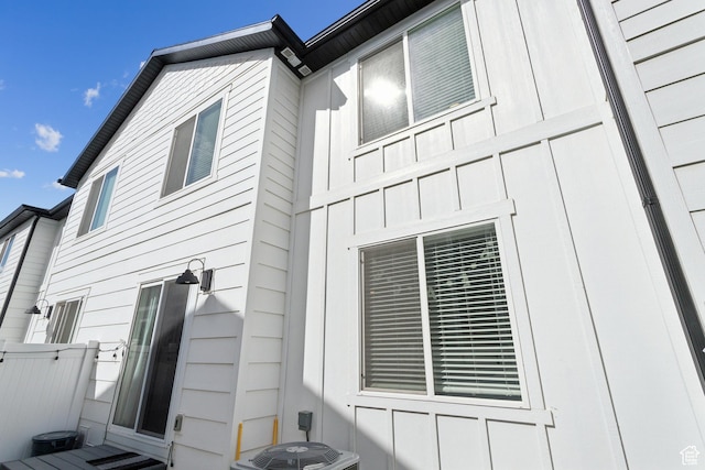1722 E Muss Dr, Eagle Mountain, UT 84005 - view of side of home with central air condition unit and board and batten siding