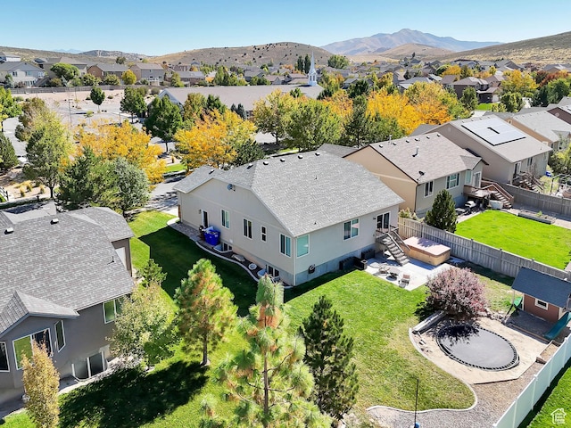 aerial perspective of suburban area with a mountain backdrop
