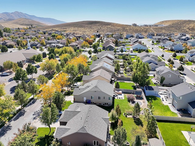 aerial perspective of suburban area with a mountain backdrop