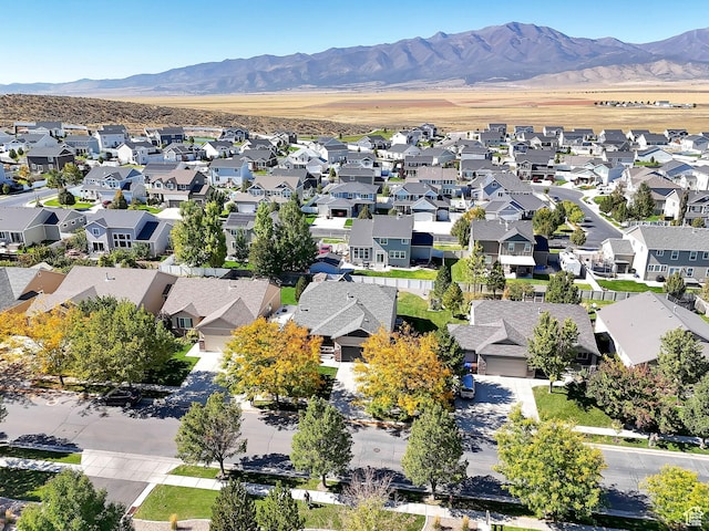 aerial perspective of suburban area with a mountain backdrop