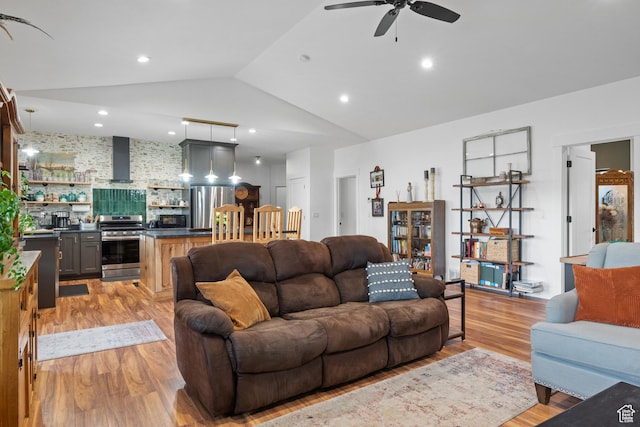 2386 N 3900 W, Corinne, UT 84307 - living area with lofted ceiling, recessed lighting, light wood-style floors, and ceiling fan