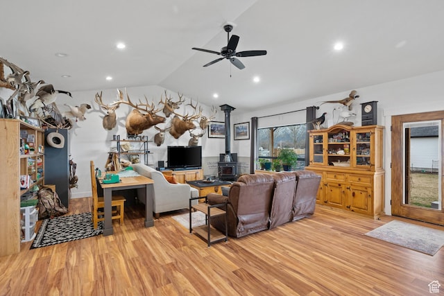 2386 N 3900 W, Corinne, UT 84307 - living area with a ceiling fan, recessed lighting, light wood finished floors, lofted ceiling, and a wood stove