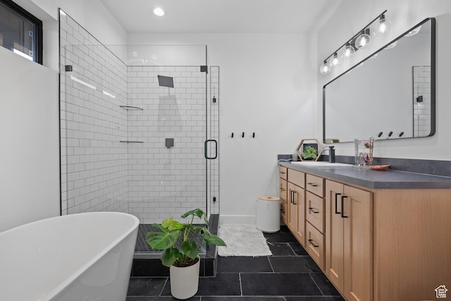 2386 N 3900 W, Corinne, UT 84307 - bathroom with baseboards, recessed lighting, a stall shower, a freestanding tub, and vanity